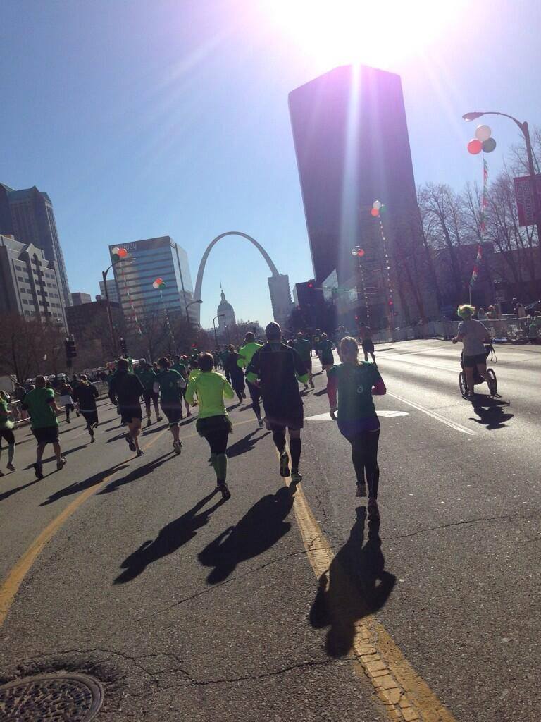Runners heading through downtown St. Louis during the parade run